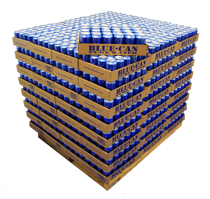 Large cube of cardboard cases sitting on pallet filled with drinking cans