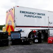 Large pull-behind trailer for water filtration devices