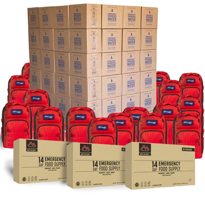 Boxes and red bags filled with emergency supplies.